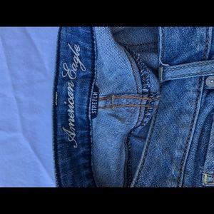 American Eagle size 4 skinny stretch with distress and glitter
